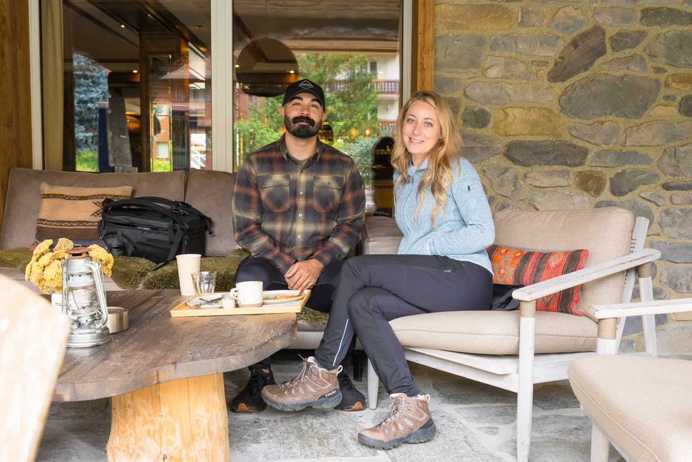 Breanna and Chance on a lodge patio